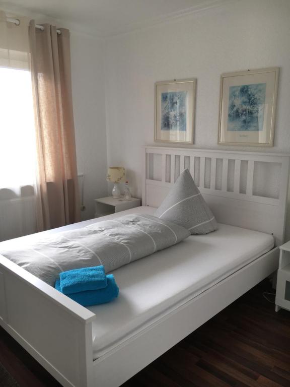 Apartment mit 2 Schlafzimmern: Schlafzimmer mit hellen Betten